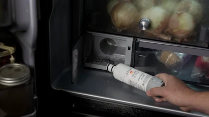 Sargents Appliance Sales and Service technician repairing a refrigerator in Reno, Sparks and Northern Nevada